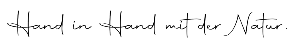 Handschriftlich "Hand in Hand mit der Natur" 